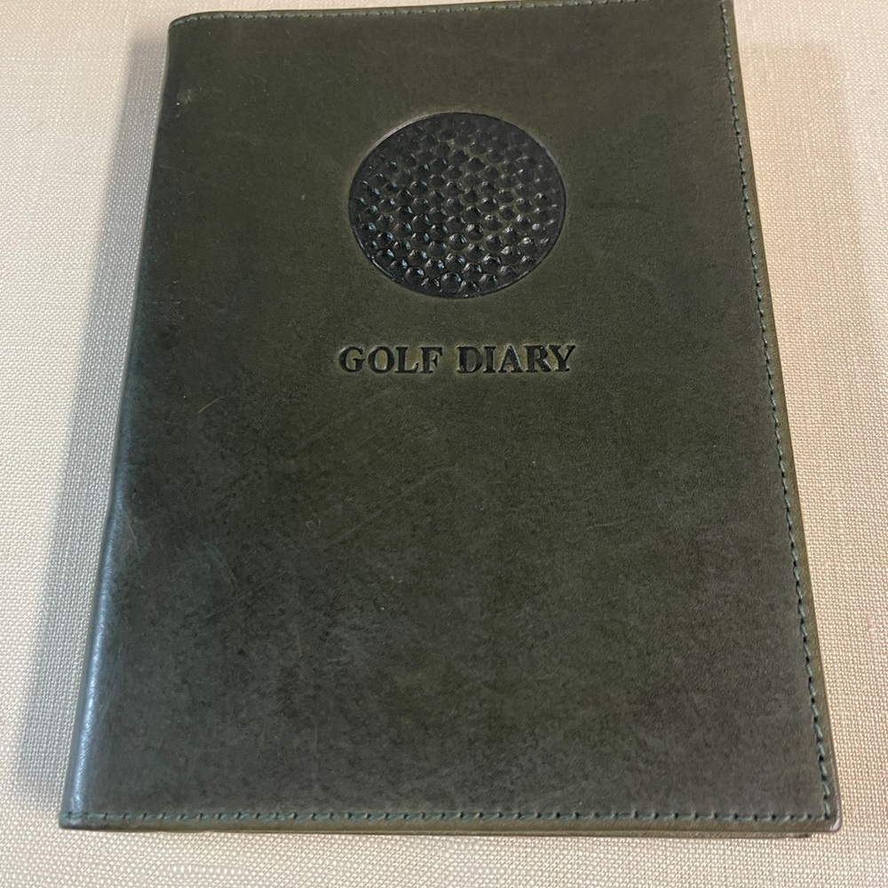 Golf Diary in green leather made in Italy - written by Vais Cencini.
